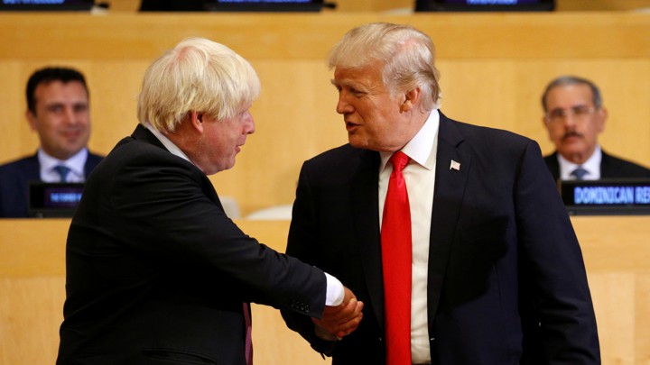 U.S. President Donald Trump shakes hands with British Foreign Secretary Boris Johnson as they take part in a session on reforming the United Nations at U.N. Headquarters in New York